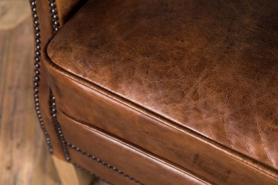 comfortable vintage brown armchair